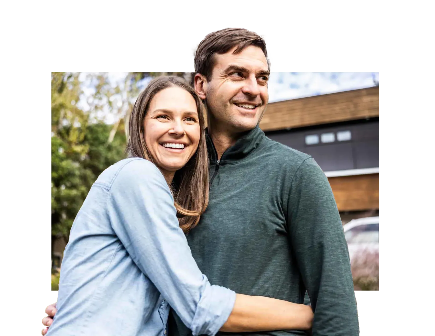 middle aged couple hugging