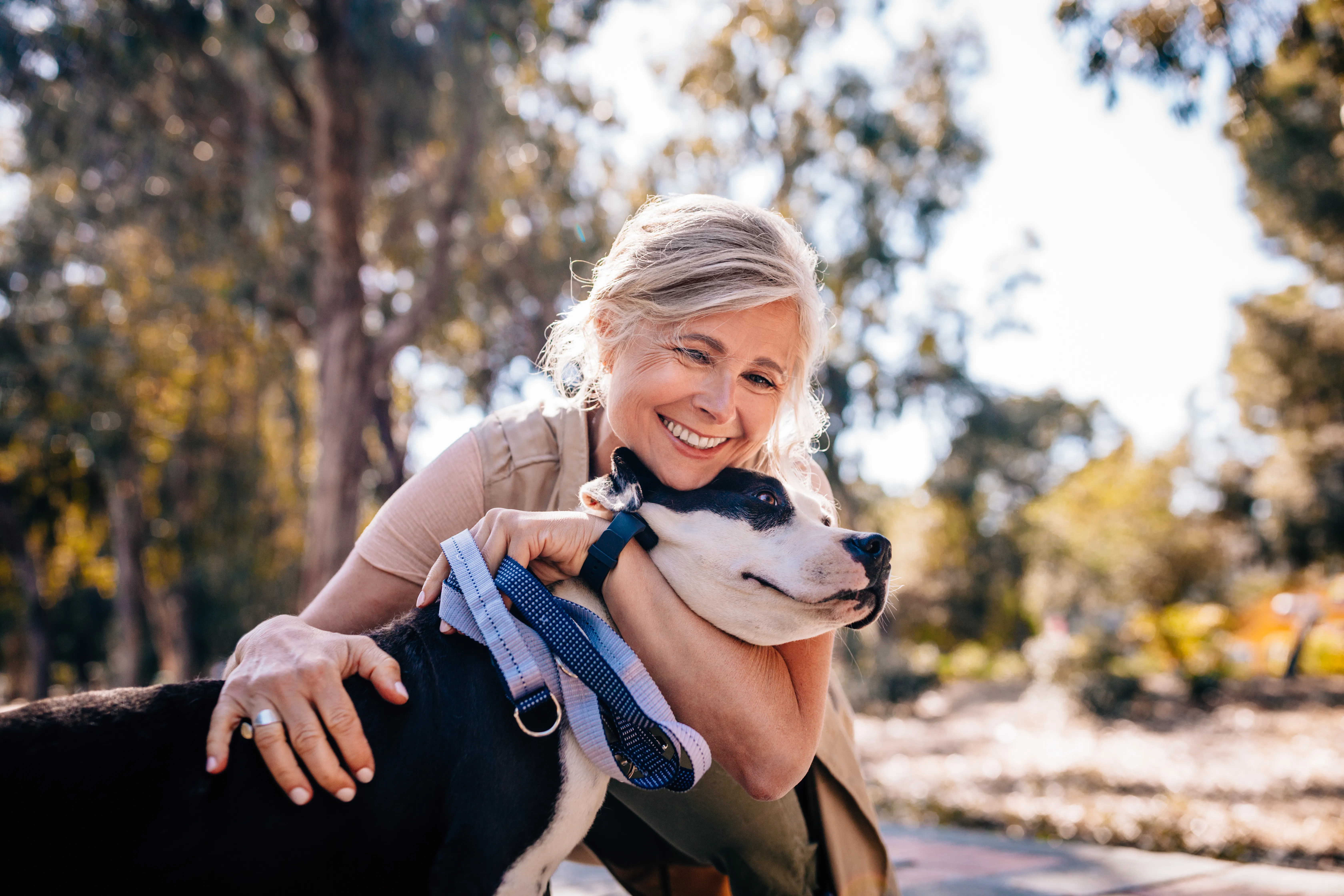 Lady with black and white dog