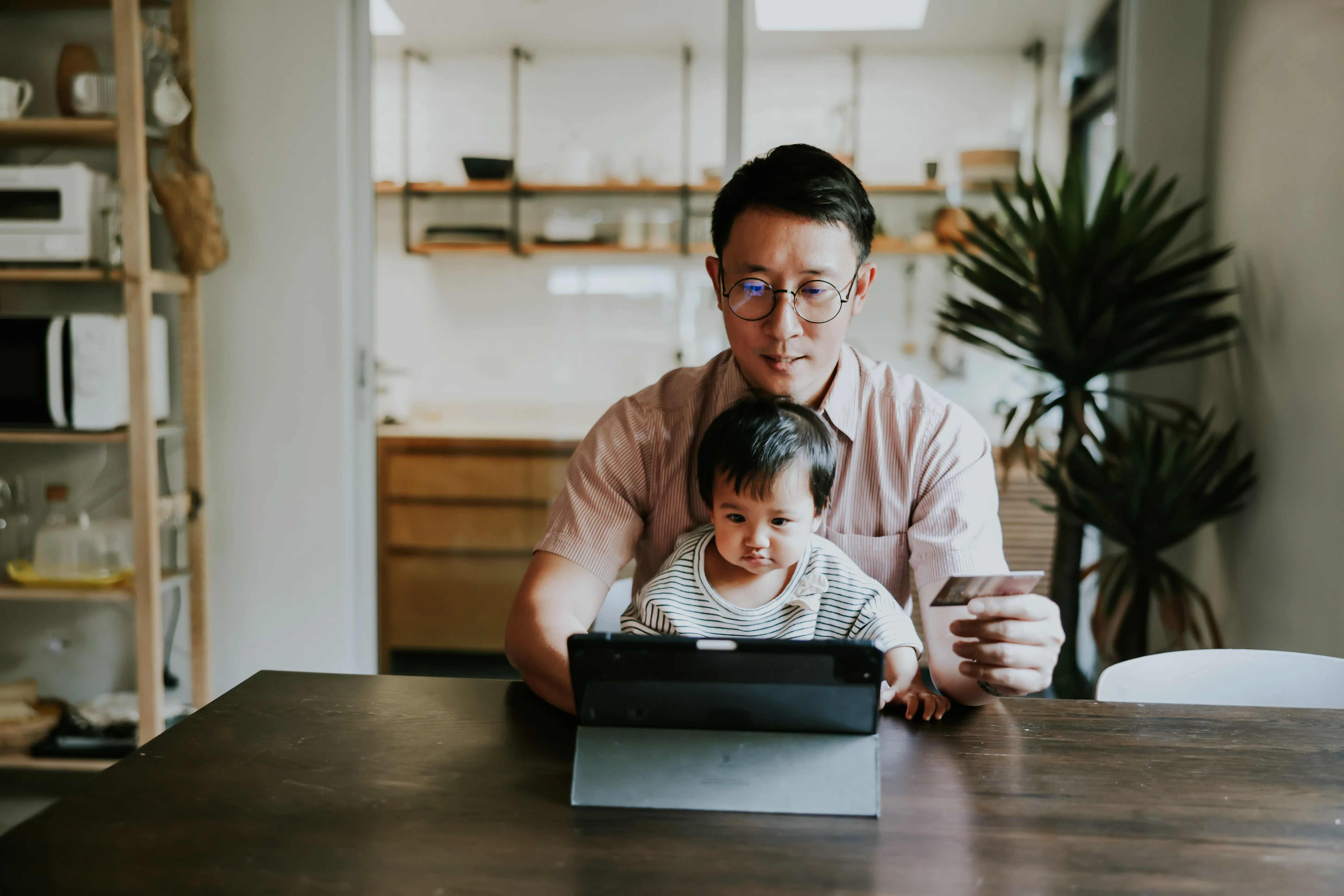 Man and Son at Computer